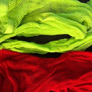 Fishnet tights / fishnets / stockings - one red, one green